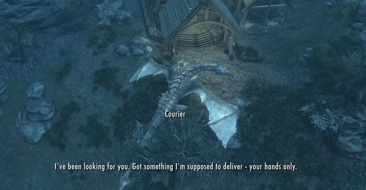 Fahdonmul the dragon cranes his neck and stares at the camera between his legs