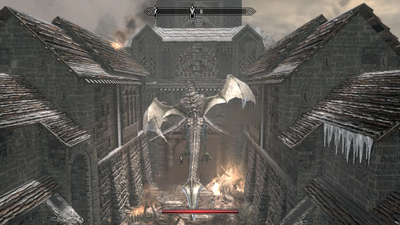 The player - a dragon - flies over the barricades at Windhelm