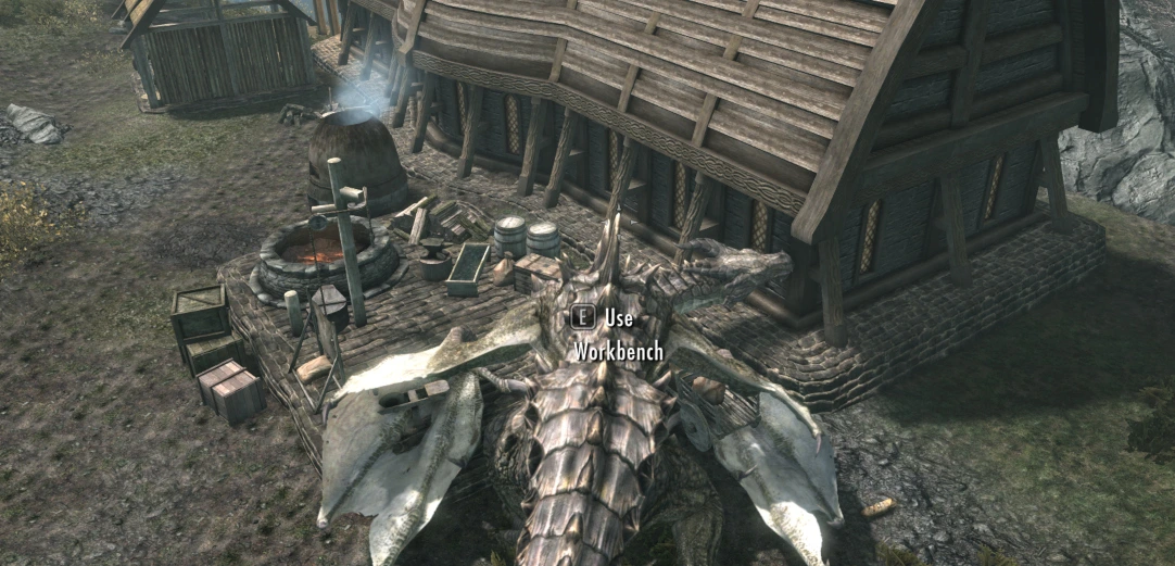 The player - a dragon - stands over a grindstone which he is unable to use in draconic form