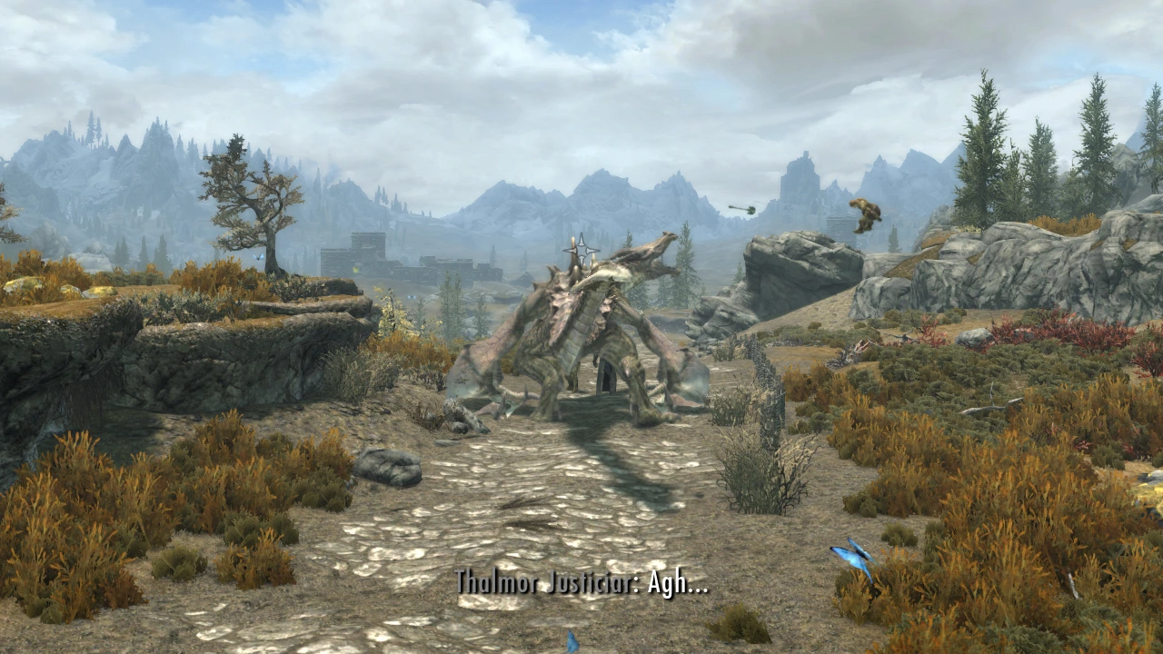 The player - a dragon - has bitten a Thalmor Justicar and spat them out.  The body is flying in an arc leaving their weapon trailing behind.